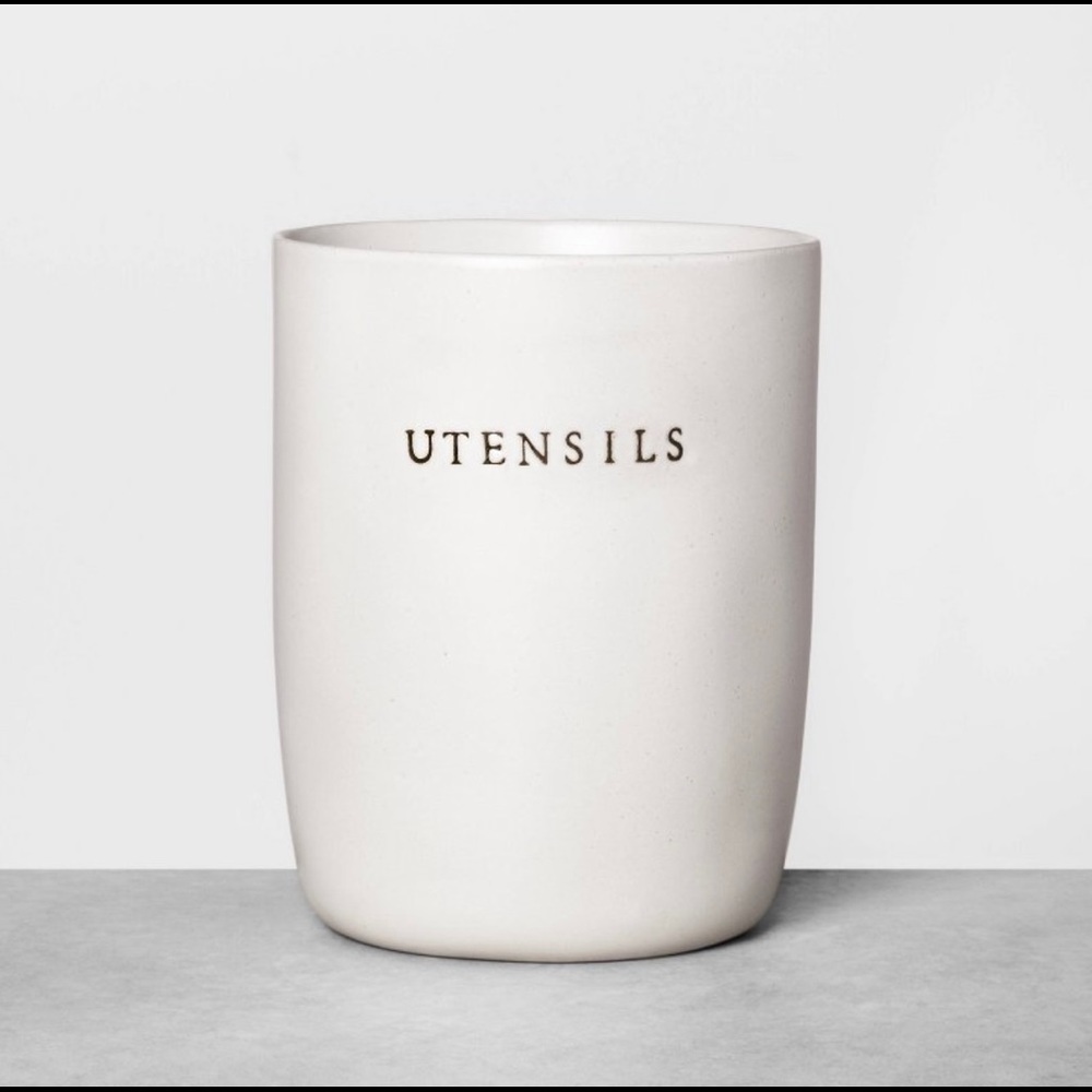 This stoneware Utensils Holder help organize your kitchen tools in great style.